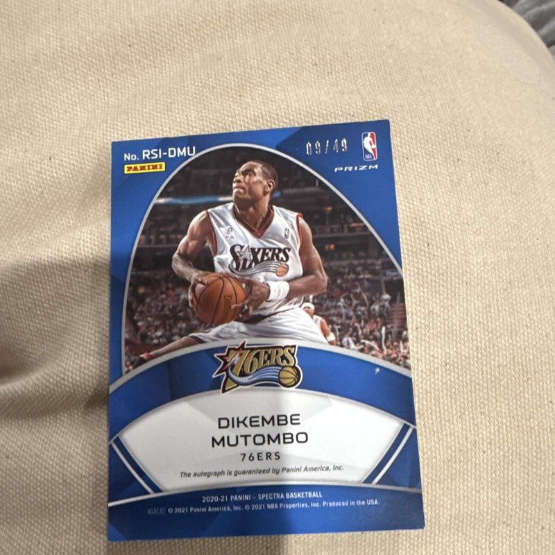 Panini Spectra 2020 21 Dikembe Mutombo Radiant Prizm Auto 09/49 RSI DMU2