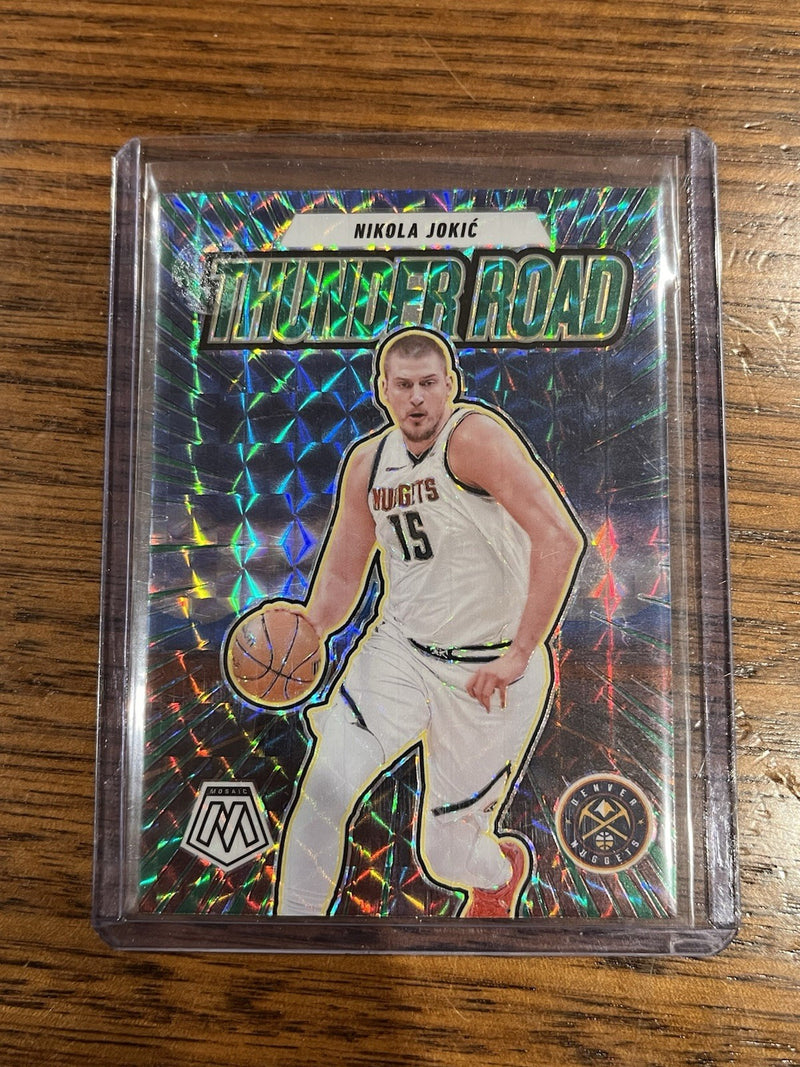 Panini 2024 25 Mosaic Basketball Thunder Road Insert No. 13 Nikola Jokić Nuggets1