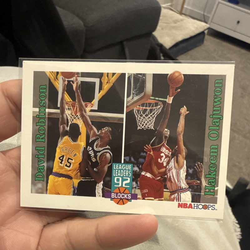 SkyBox NBA Hoops 1992 League Leaders 92 Blocks #323 Robinson Olajuwon0