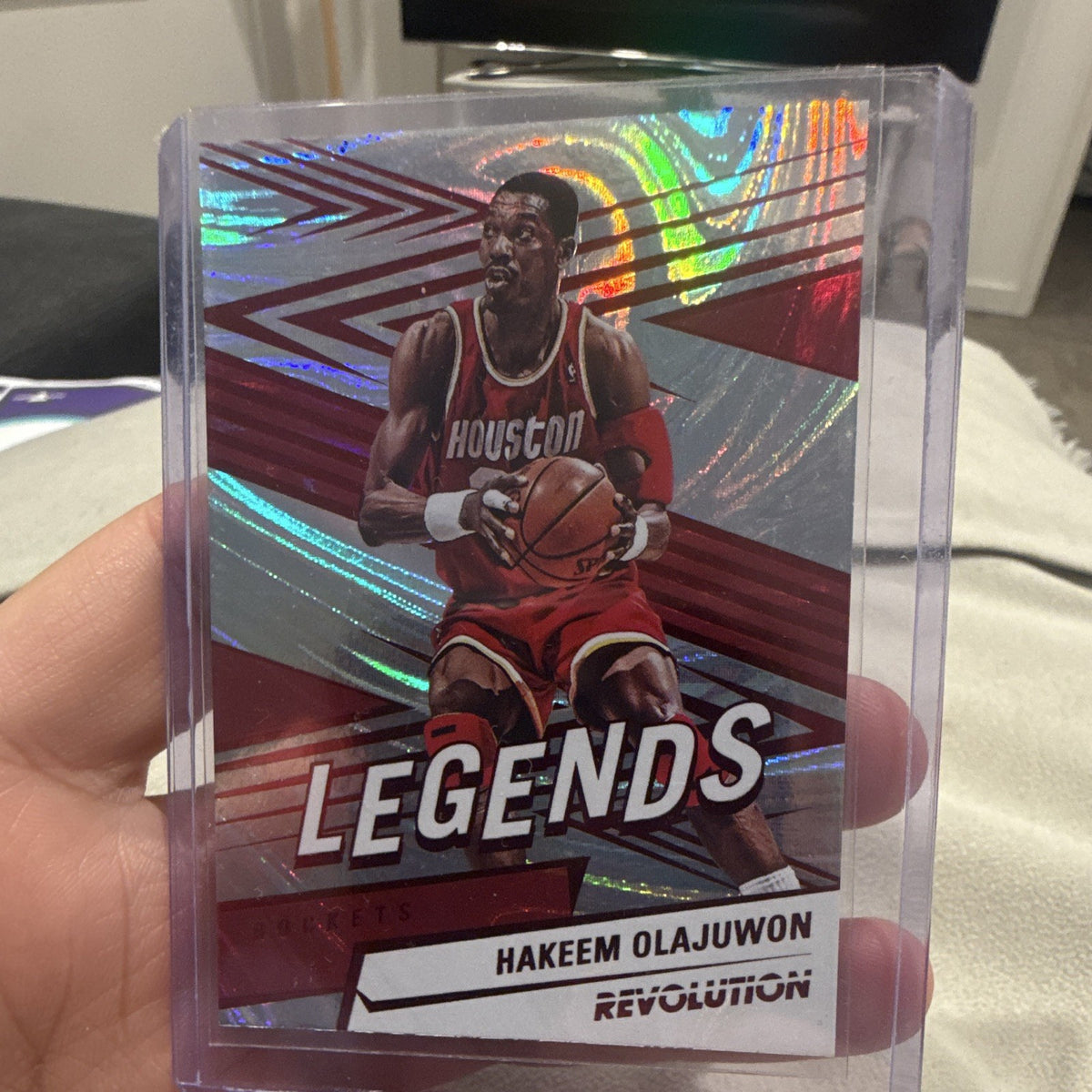 Panini 2024 25 Revolution Legends Hakeem Olajuwon Swirl Parallel #1680