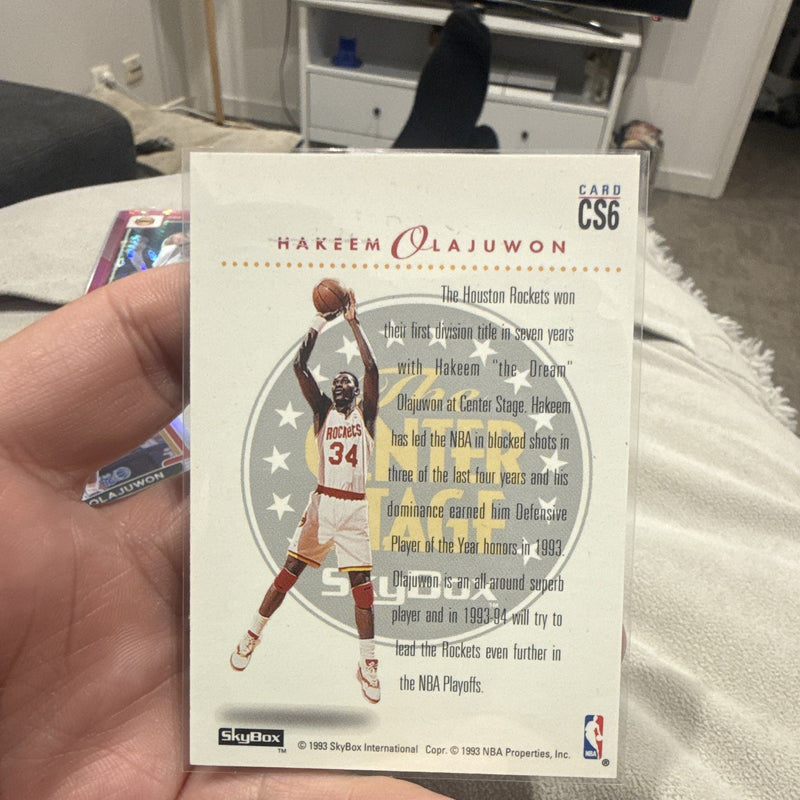 SkyBox The Center Stage Insert 1993 94 Hakeem Olajuwon Rockets CS61