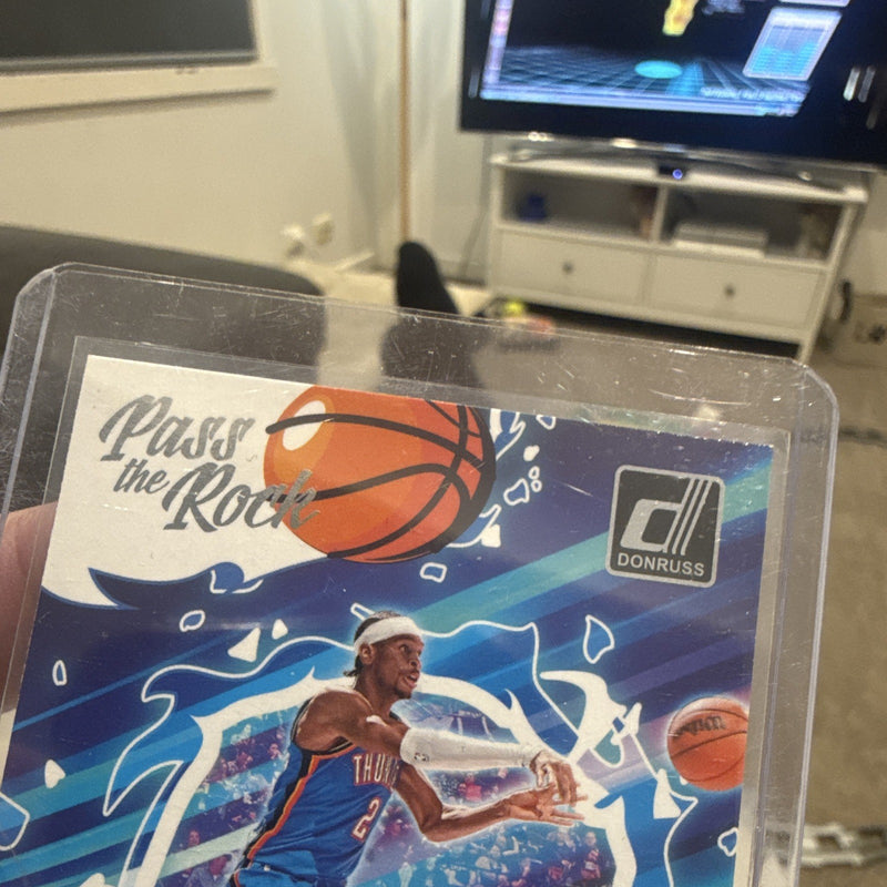 Shai Gilgeous Alexander Pass the Rock Panini Donruss 2024 25 #7 OKC2