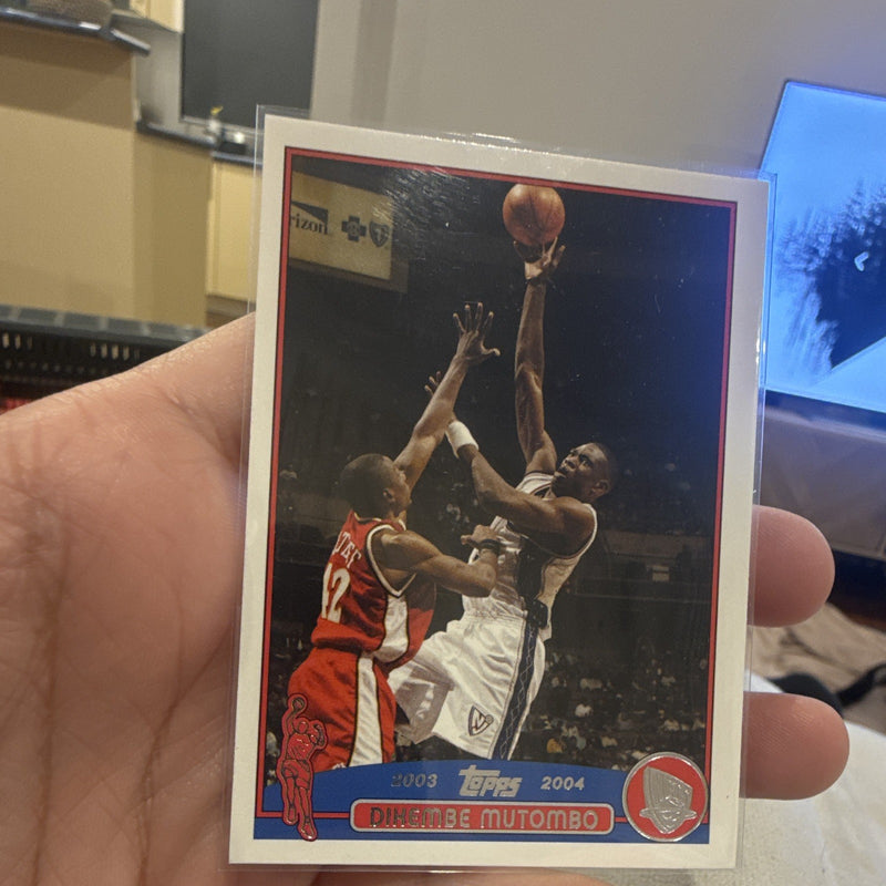 Topps 2003 04 Base Set Dikembe Mutombo New Jersey Nets Card #550