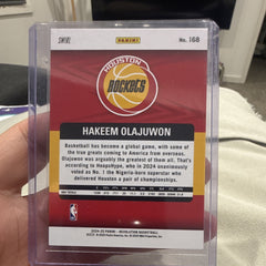 Panini 2024 25 Revolution Legends Hakeem Olajuwon Swirl Parallel #1681